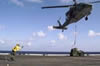 ABH2 Edmond handles a helo during a Vertrep onboard USS DULUTH