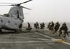 Marines load onto helo enroute Kuwait